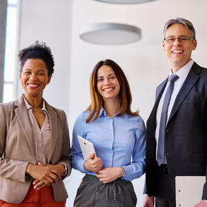group of colleagues smiling together